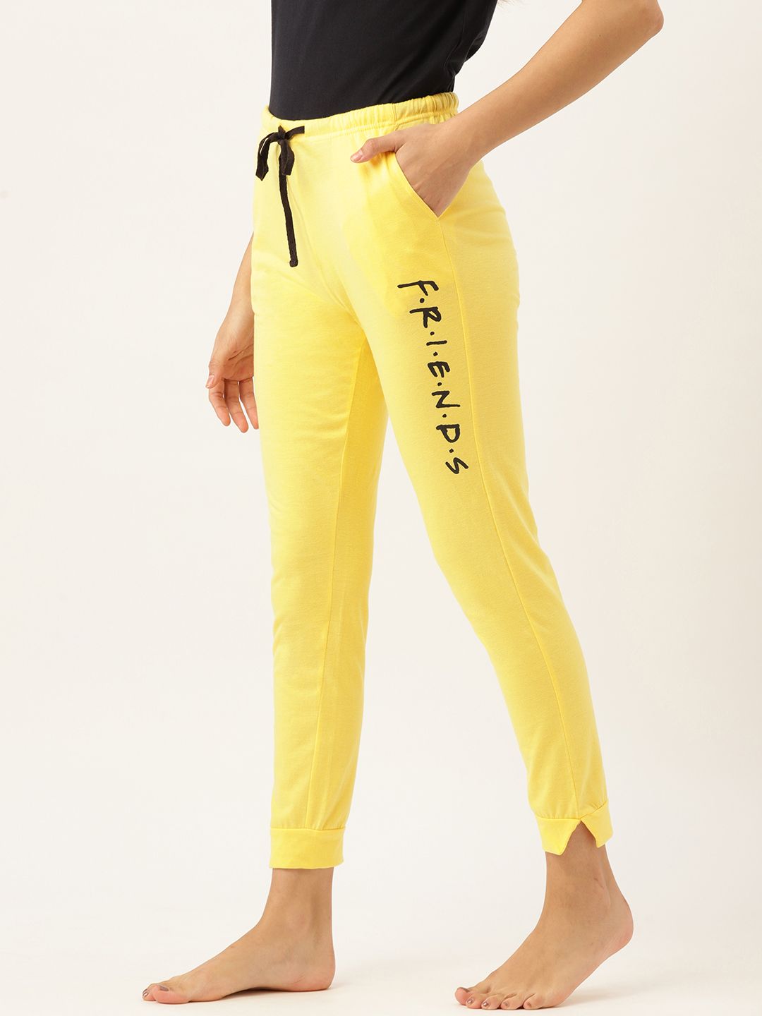 FRIENDS by DressBerry Women Yellow Solid Lounge Joggers Price in India