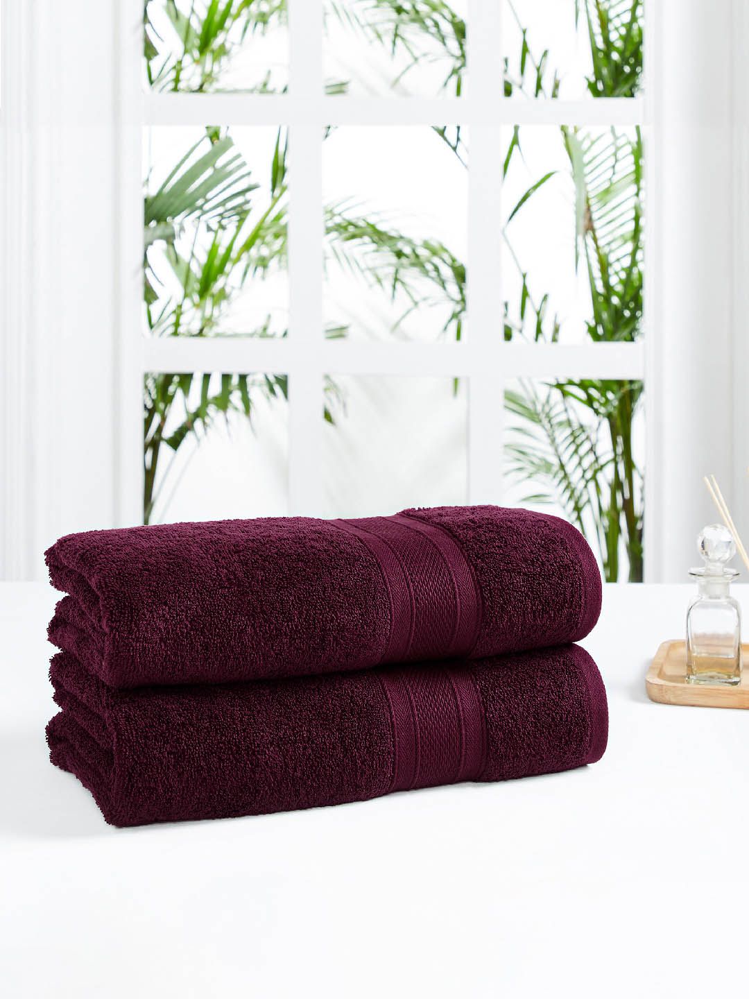 Trident Burgundy Set of 2 Solid Cotton 500 GSM Bath Towels Price in India