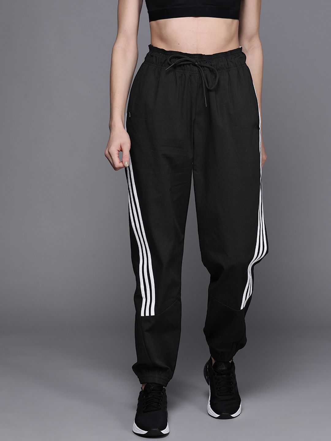 ADIDAS Women Black I Woven Solid Sustainable Track Pants Price in India