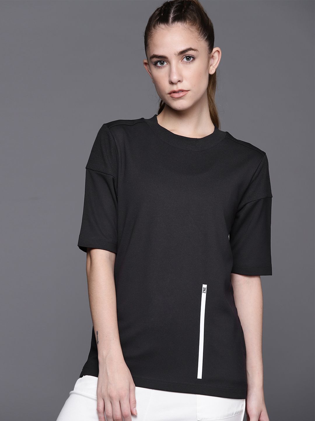 ADIDAS Women Black Solid T-Shirt Price in India