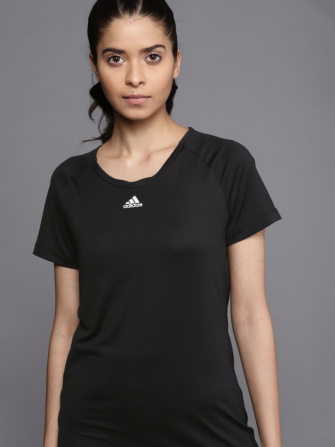 ADIDAS Women Black Solid Slim Fit Training or Gym Sustainable T-shirt Price in India