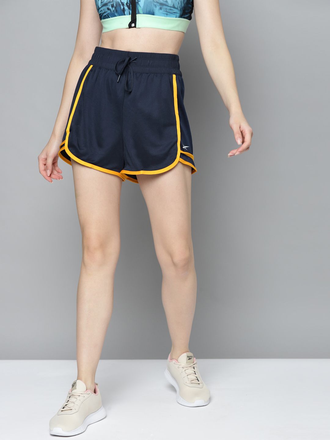 Reebok Women Navy Blue Regular Shorts With Side Stripes Price in India