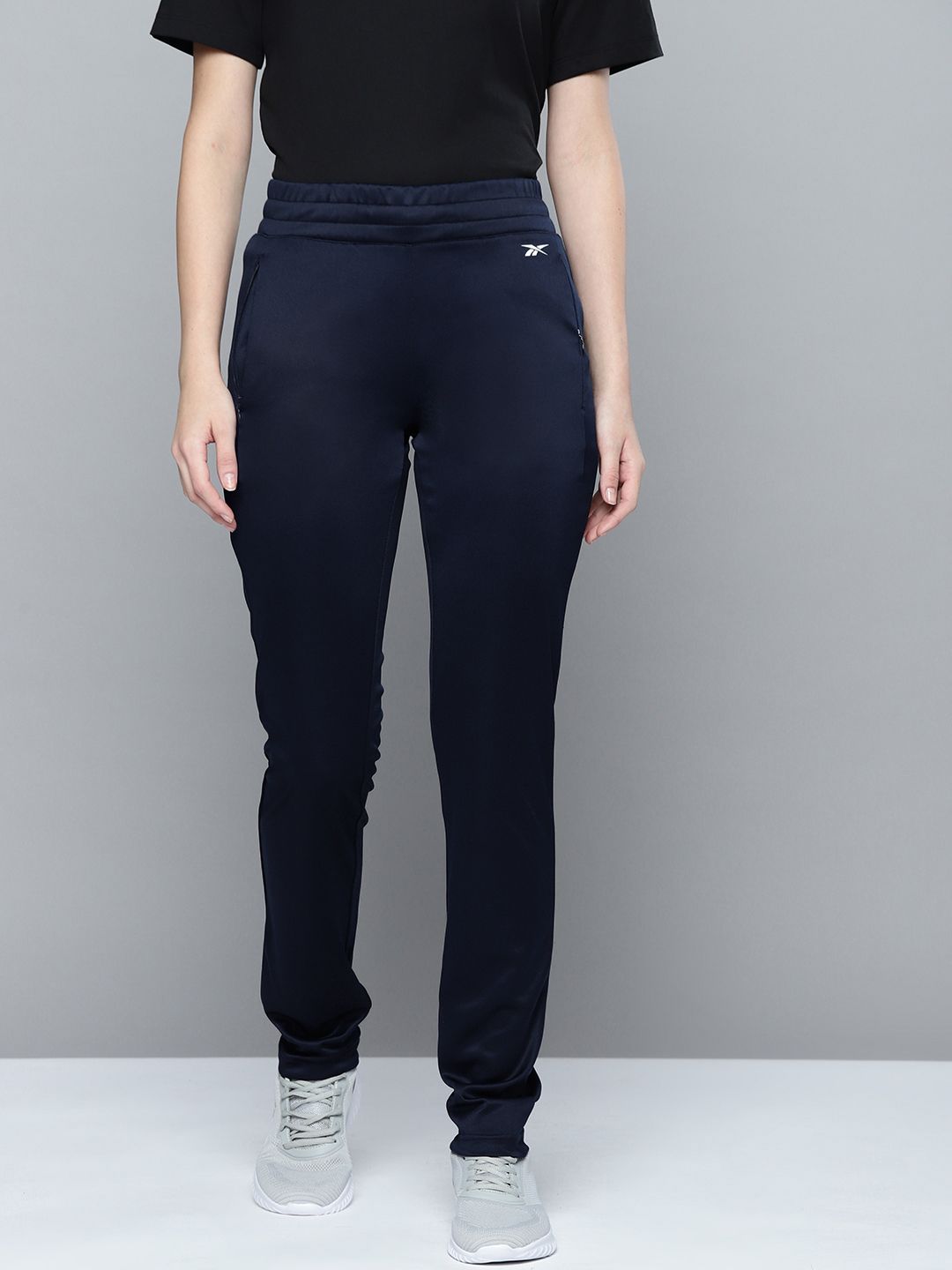 Reebok Women Navy Blue Solid Slim-Fit Training Craft Track Pants Price in India