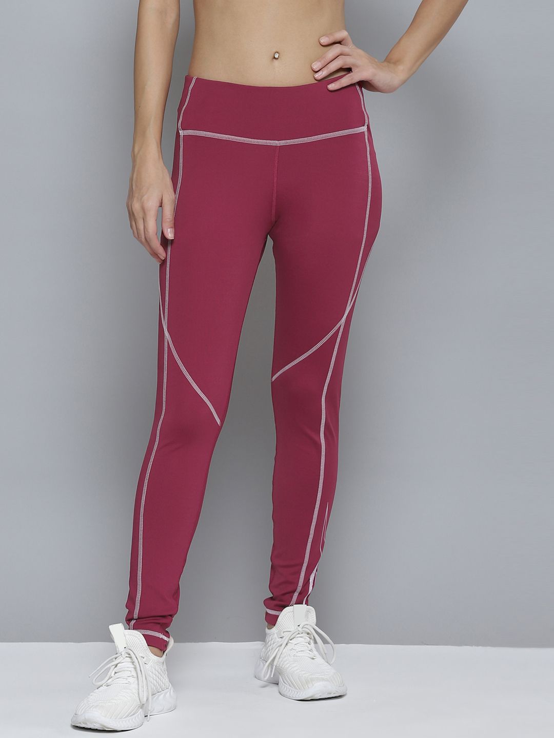 Reebok Women Magenta Solid Training Essentials  Tights Price in India