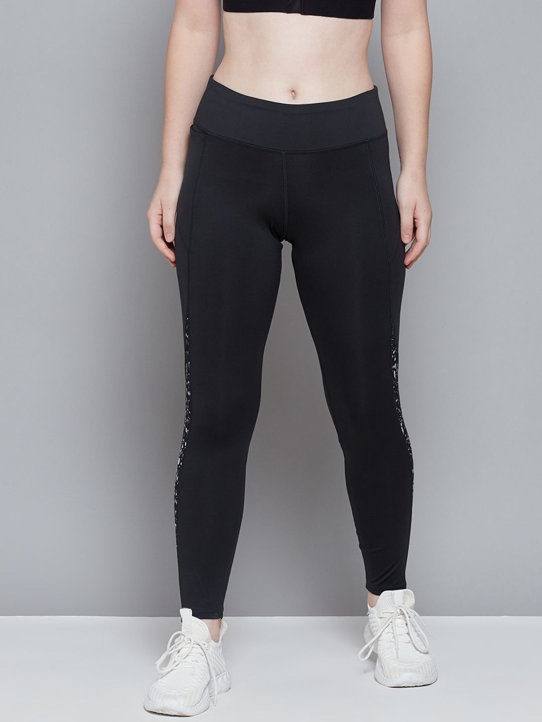 Reebok Women Black Printed Fitted Speedwick Workout Running Tights Price in India