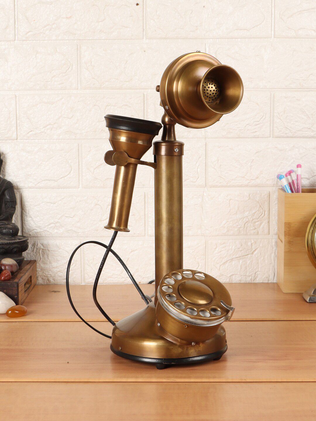 EXIM DECOR Gold-Toned & Black Antique Candle Style Telephone Showpiece Price in India