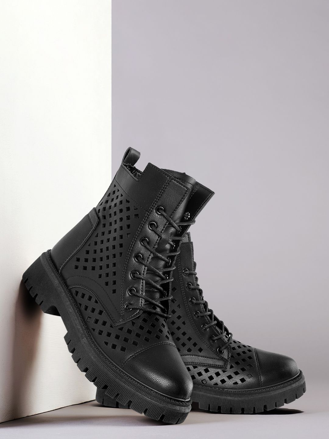 DressBerry Women Black Laser Cuts Mid-Top Flat Boots Price in India