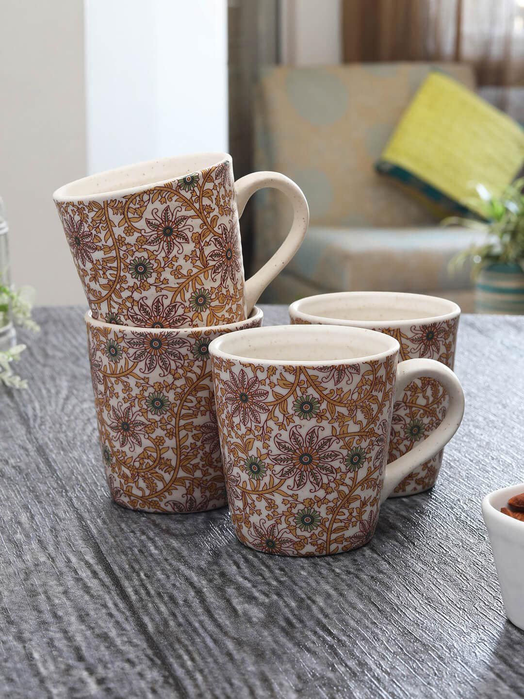 MIAH Decor Off White & Yellow Handcrafted and Hand Painted 4-Pieces Printed Mugs Set Price in India