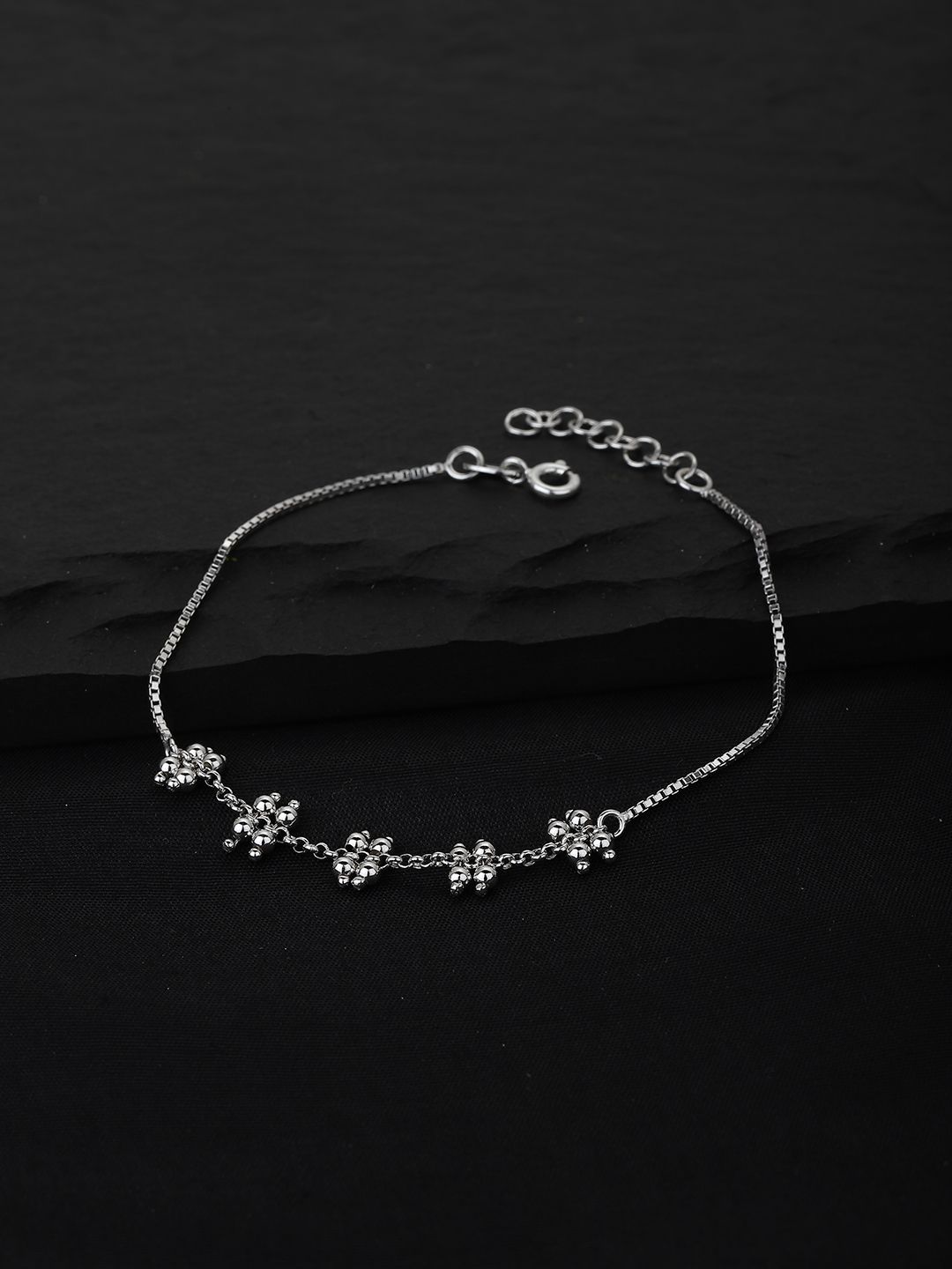 Carlton London Women Silver-Toned Rhodium-Plated Link Bracelet Price in India