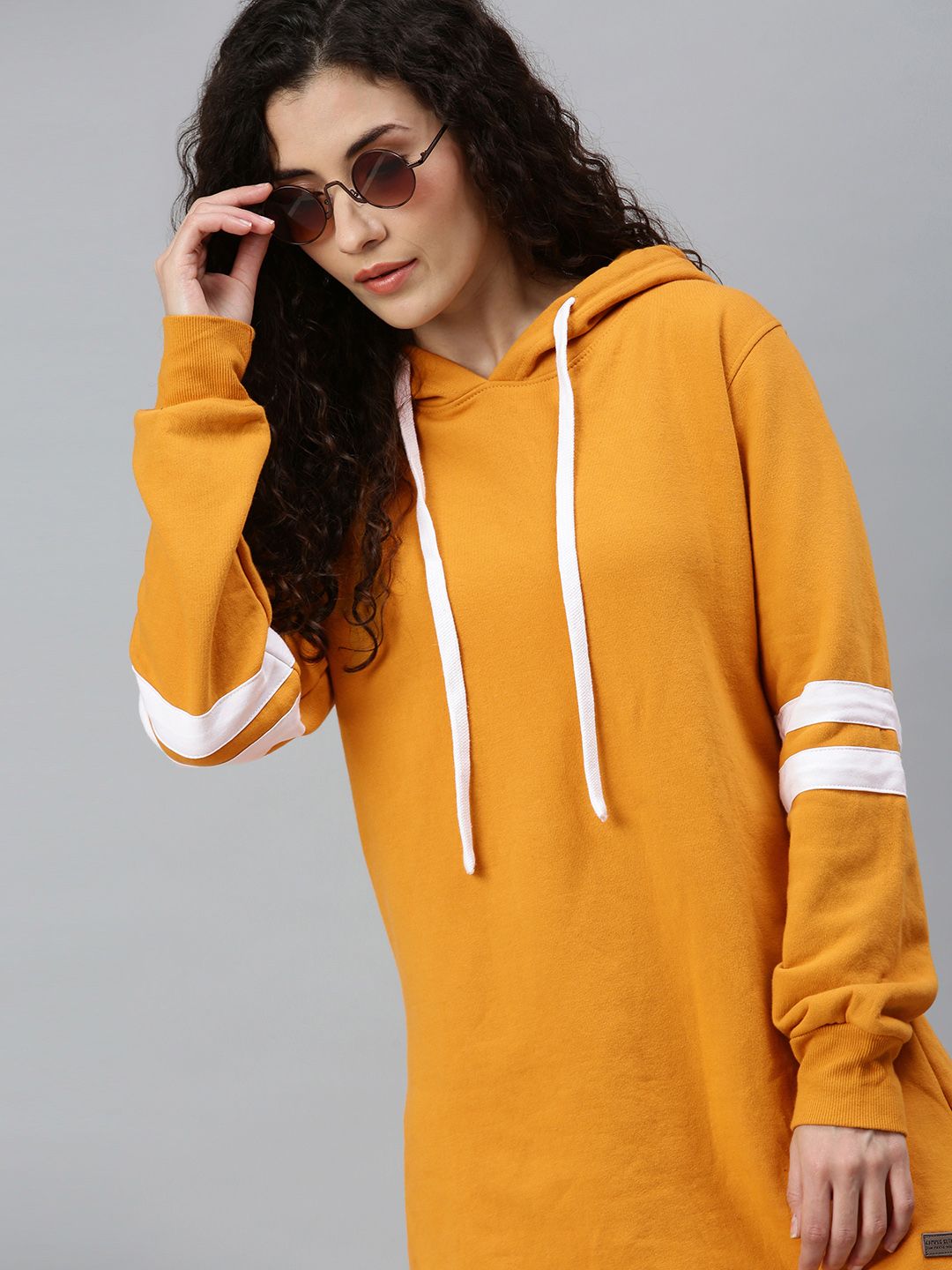 Campus Sutra Women Mustard Yellow Striped Sleeve Hooded Pullover Longline Sweatshirt Price in India