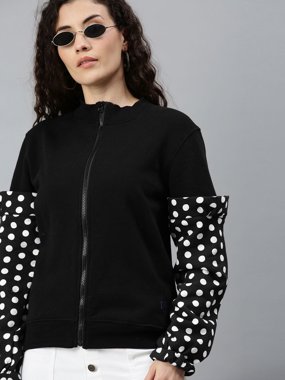 Campus Sutra Women Black Solid Front Open Sweatshirt with Polka Dots Detail Sleeves Price in India