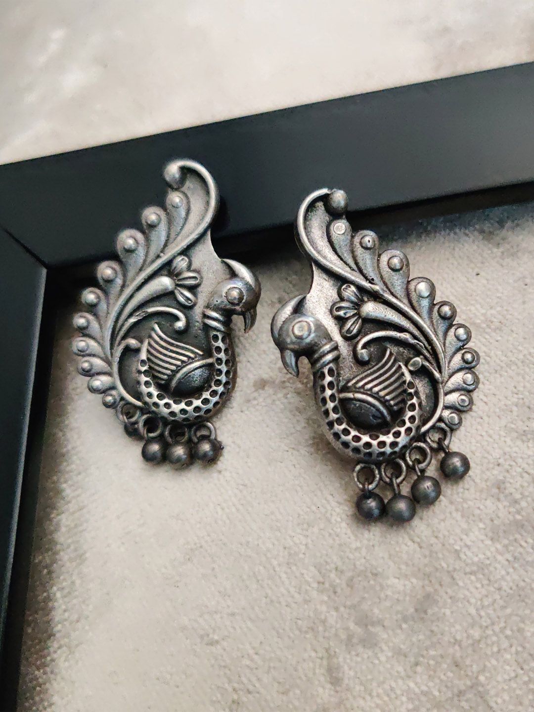 Binnis Wardrobe Women Silver-Toned German Silver Peacock Shaped  Earrings Price in India