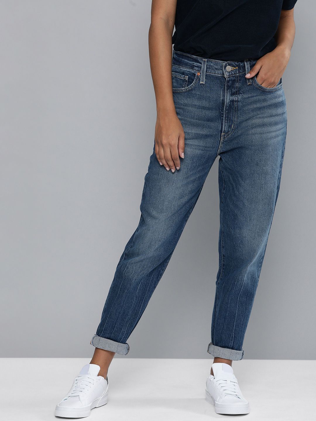 Levis Women Blue Tapered Fit Light Fade Mid-Rise Stretchable Jeans Price in India