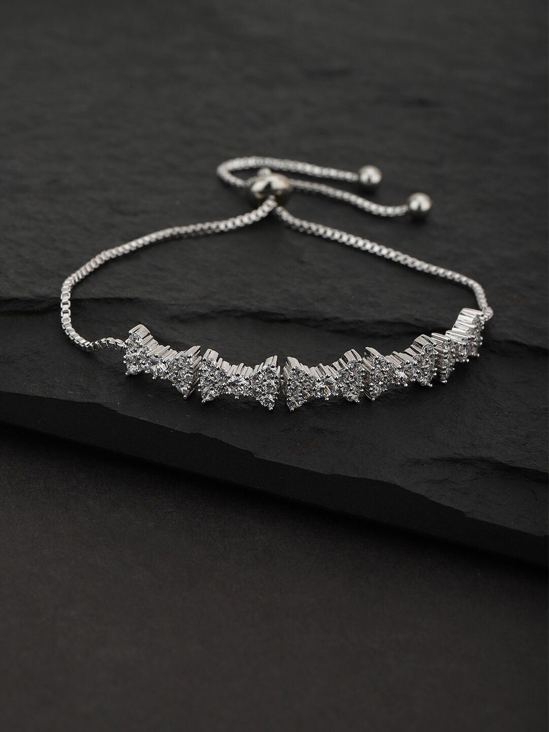 Carlton London Women Silver-Toned Rhodium-Plated Charm Bracelet Price in India