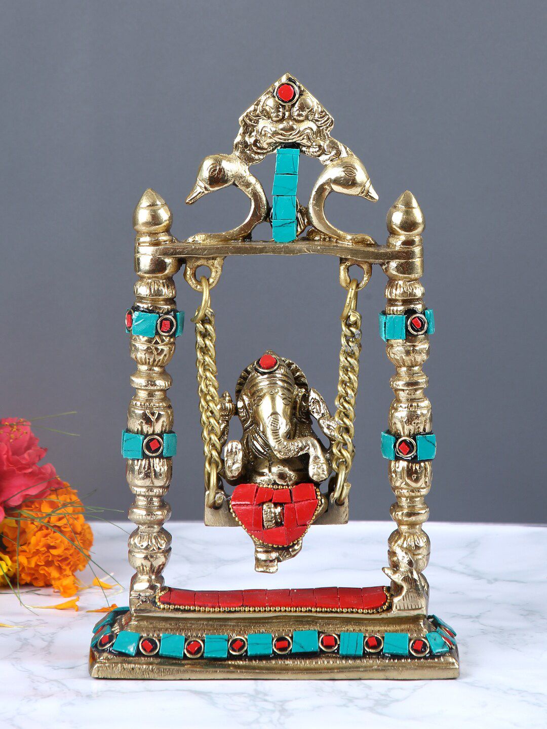 Aapno Rajasthan Gold-Toned & Red Handcrafted Lord Ganesh Jhula Statue Price in India