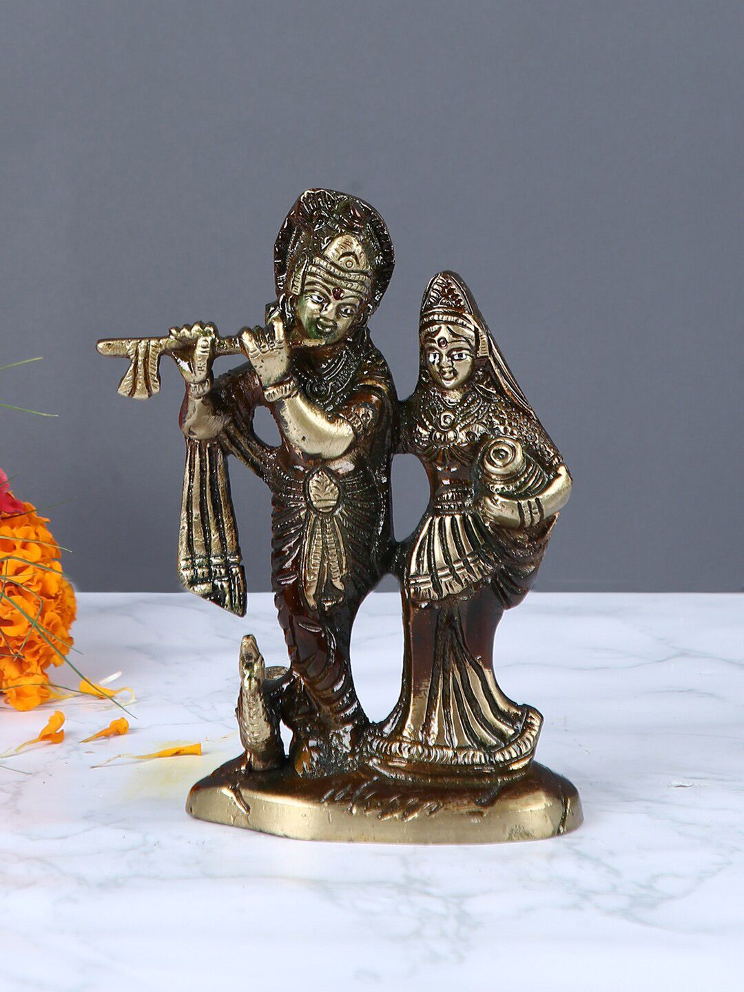 Aapno Rajasthan Brown & Gold-Toned Brass Radha Krishna Showpiece Price in India