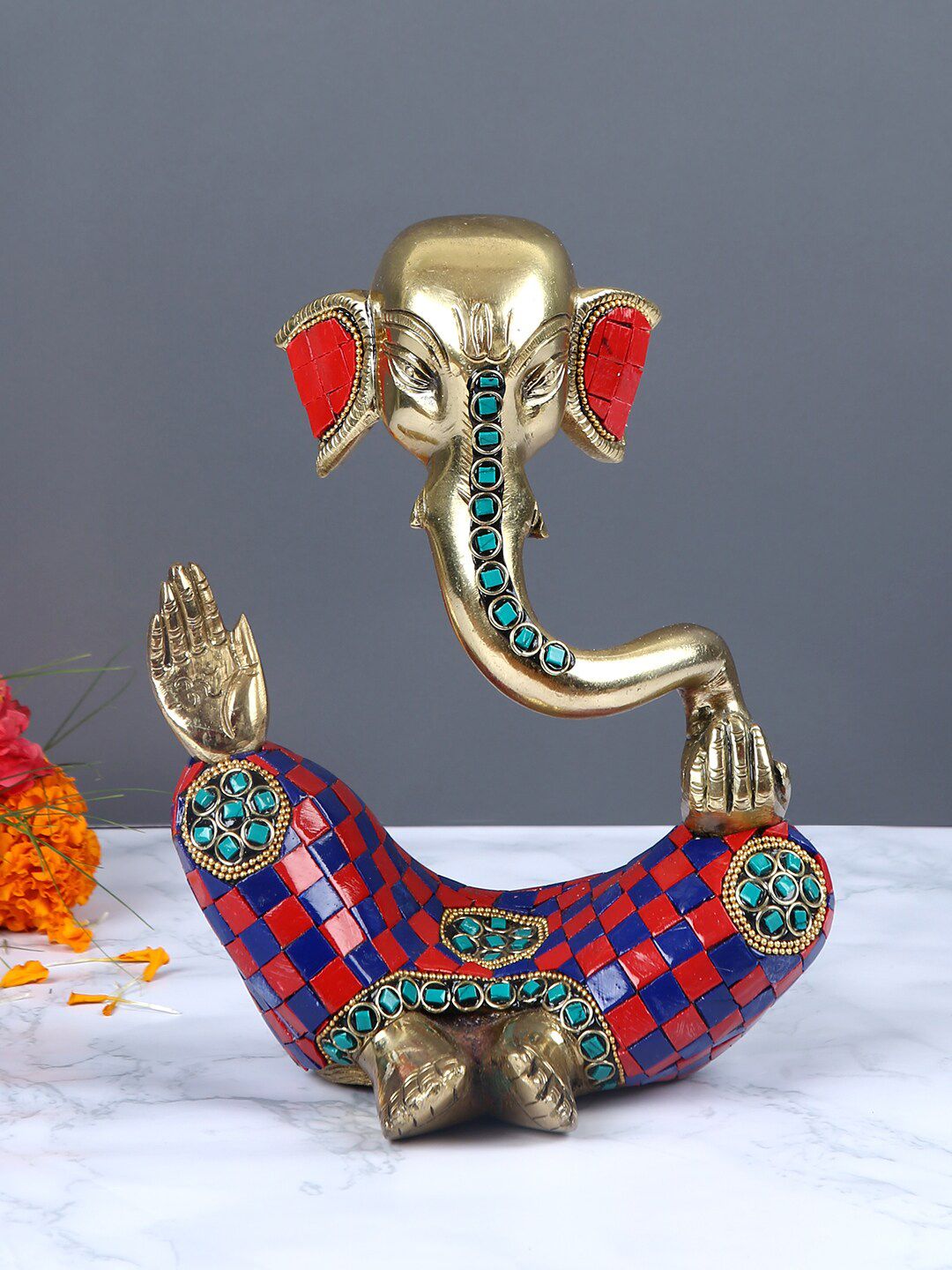 Aapno Rajasthan Gold-Toned & Red Brass Abstract Ganesha Showpiece Price in India