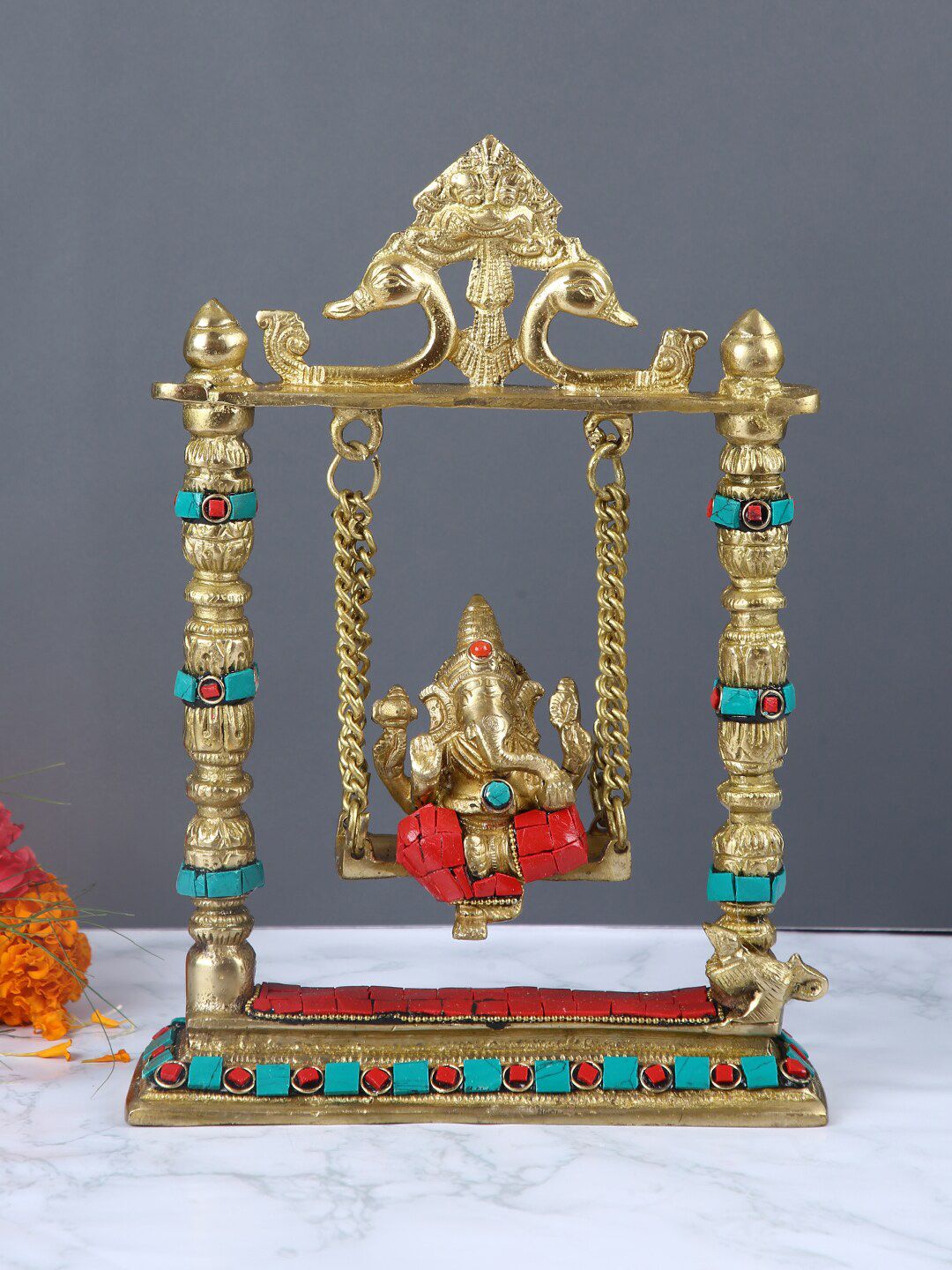 Aapno Rajasthan Gold-Toned & Red Brass Lord Ganesh in Jhula Statue Showpiece Price in India