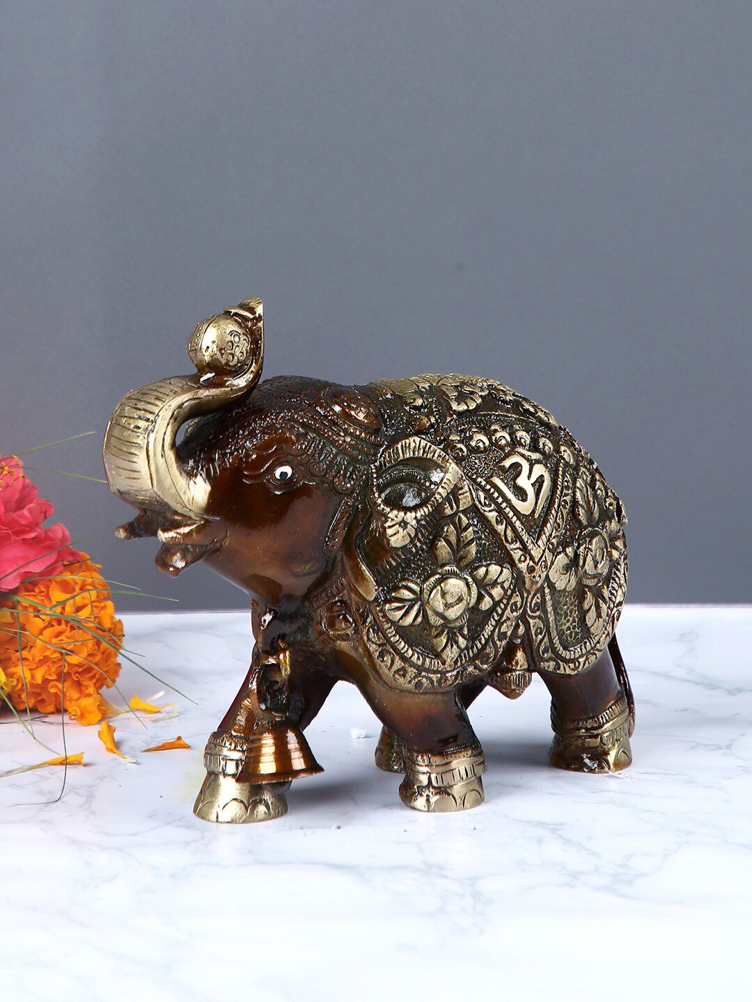 Aapno Rajasthan Brown & Gold-Toned Handcrafted Elephant Showpiece Price in India