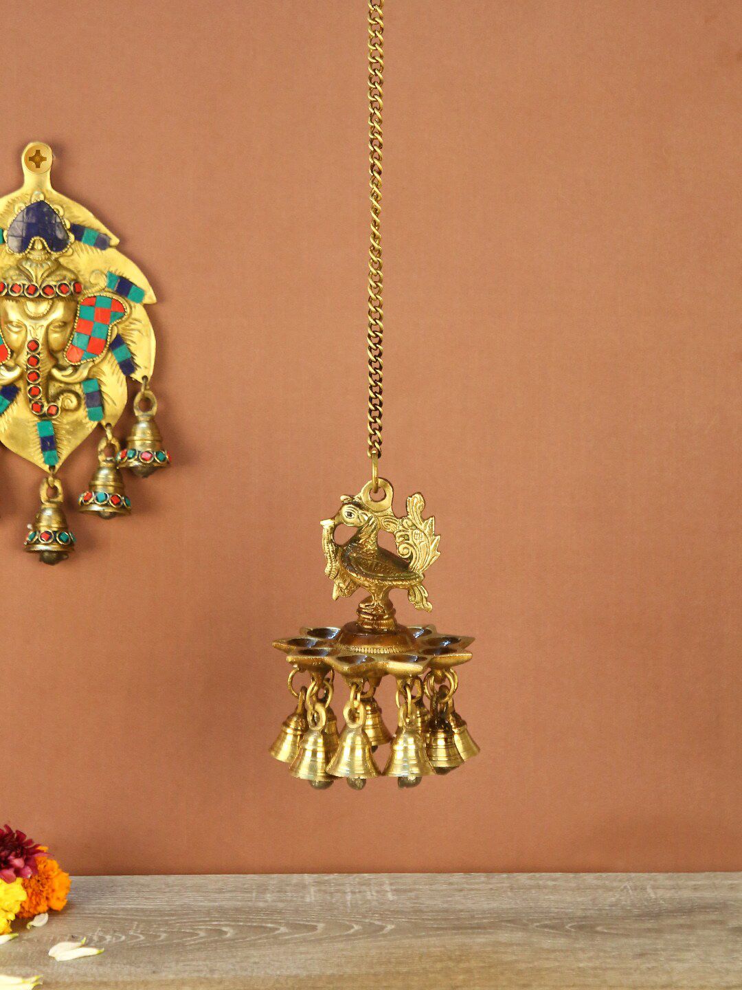Aapno Rajasthan Gold-Toned & Brown Peacock Hanging Oil Lamp Price in India