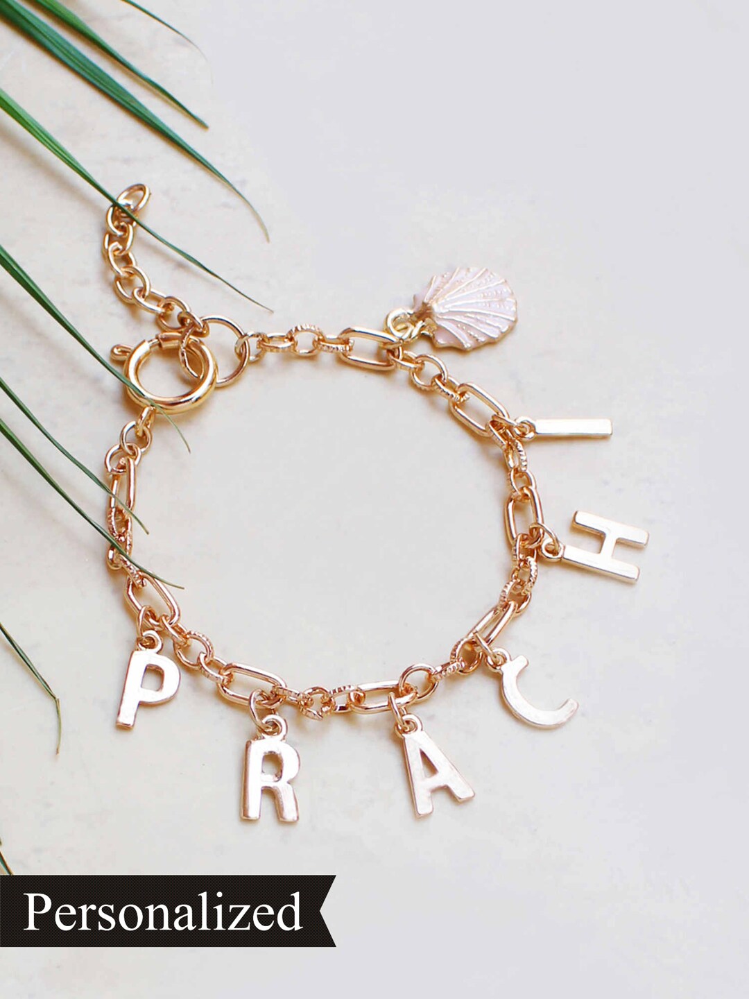 Runway Ritual Women Gold-Toned & Pink Gold-Plated Charm Bracelet Price in India