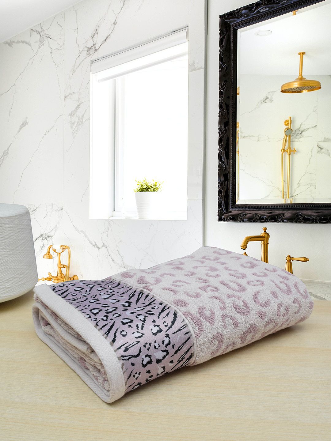 RANGOLI Purple & White Leopard Printed 541GSM Pure Cotton Bath Towel Price in India