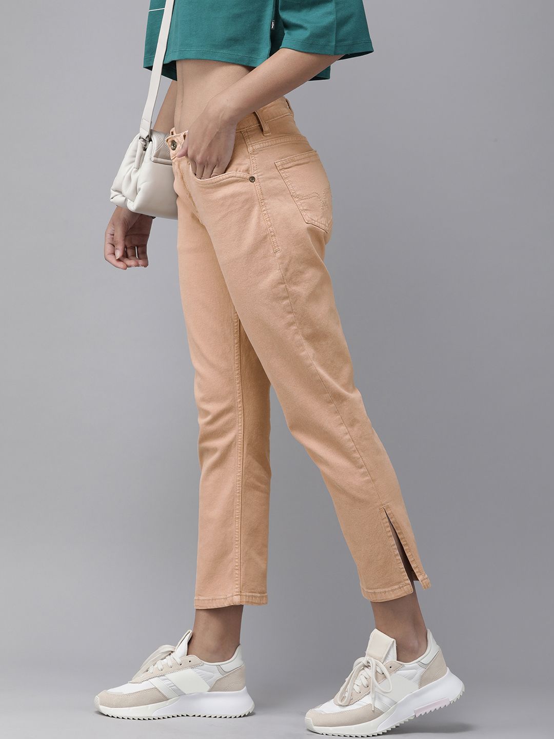 The Roadster Lifestyle Co Women Beige Straight Fit Stretchable Jeans Price in India