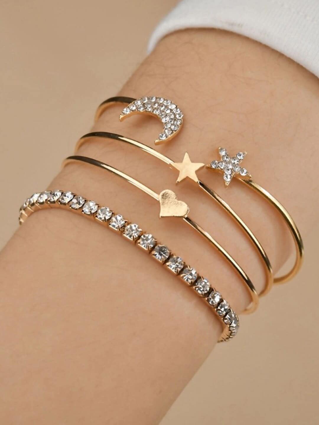 Shining Diva Fashion Women Set of 4 Gold-Plated  White Crystals Cuff Bracelets Price in India
