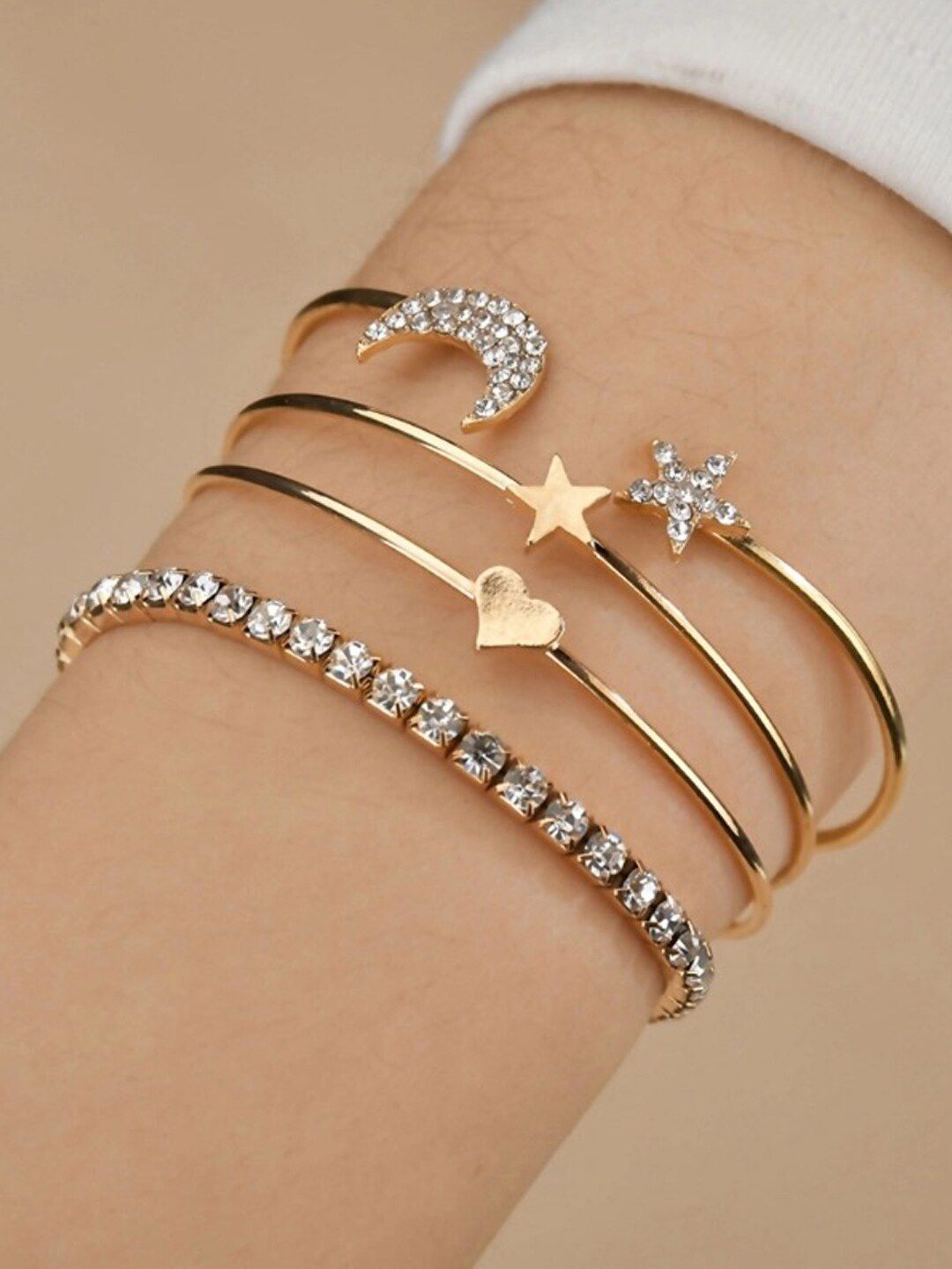 Shining Diva Fashion Women Set of 4 Gold-Plated  White Crystals Cuff Bracelets Price in India