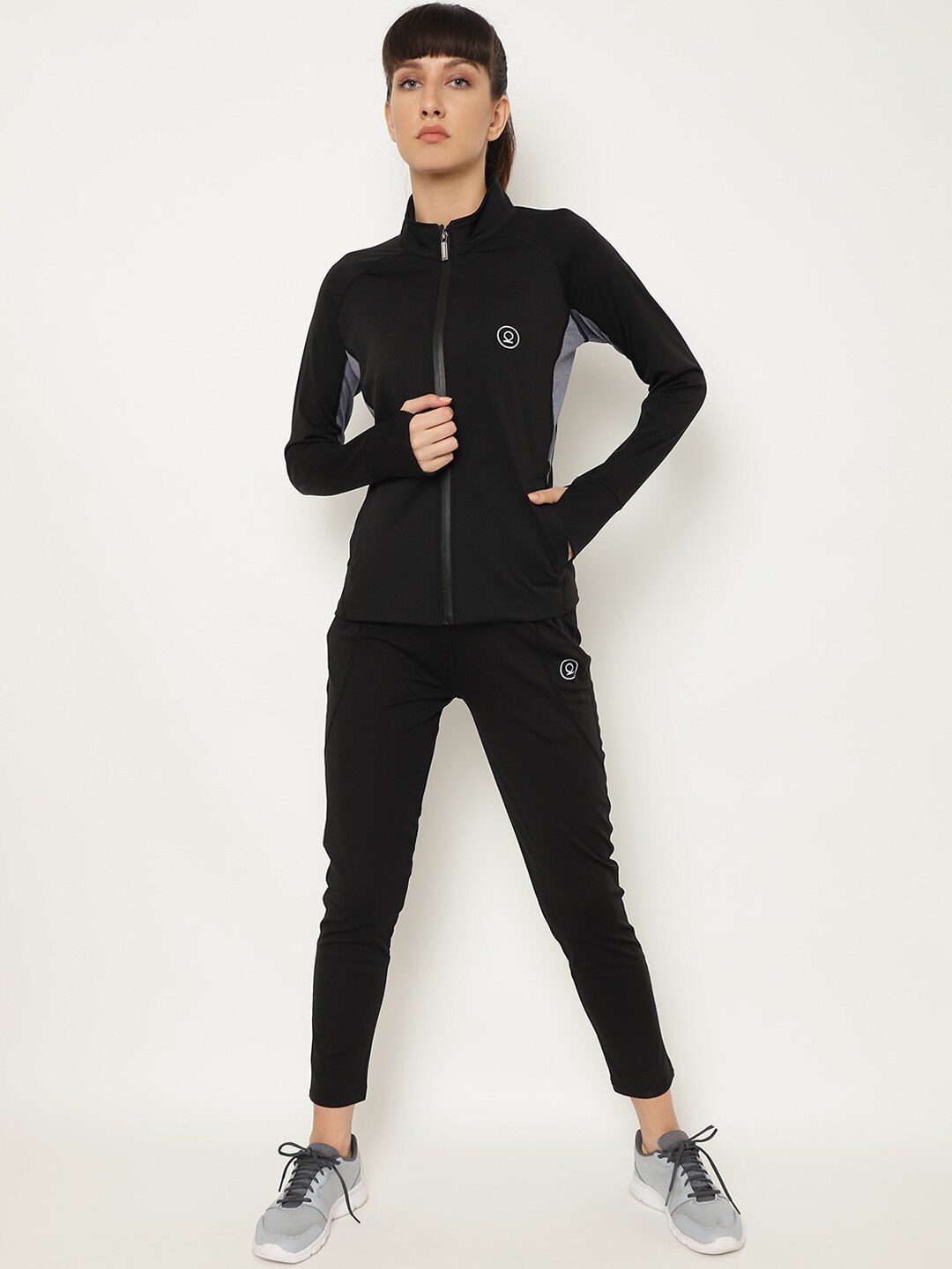 Chkokko Women Black Solid Sports Tracksuit Price in India