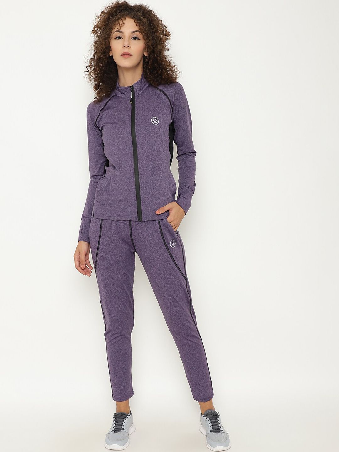 Chkokko Women Purple Solid Sports Tracksuit Price in India