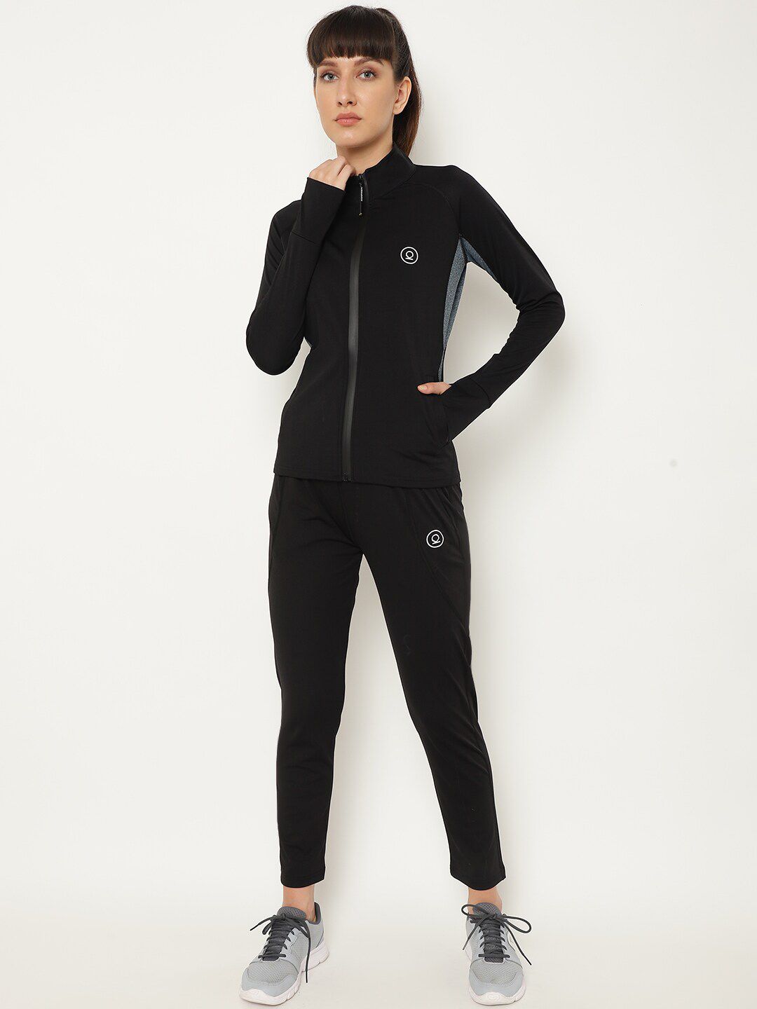 Chkokko Women Black Solid Sports Tracksuit Price in India