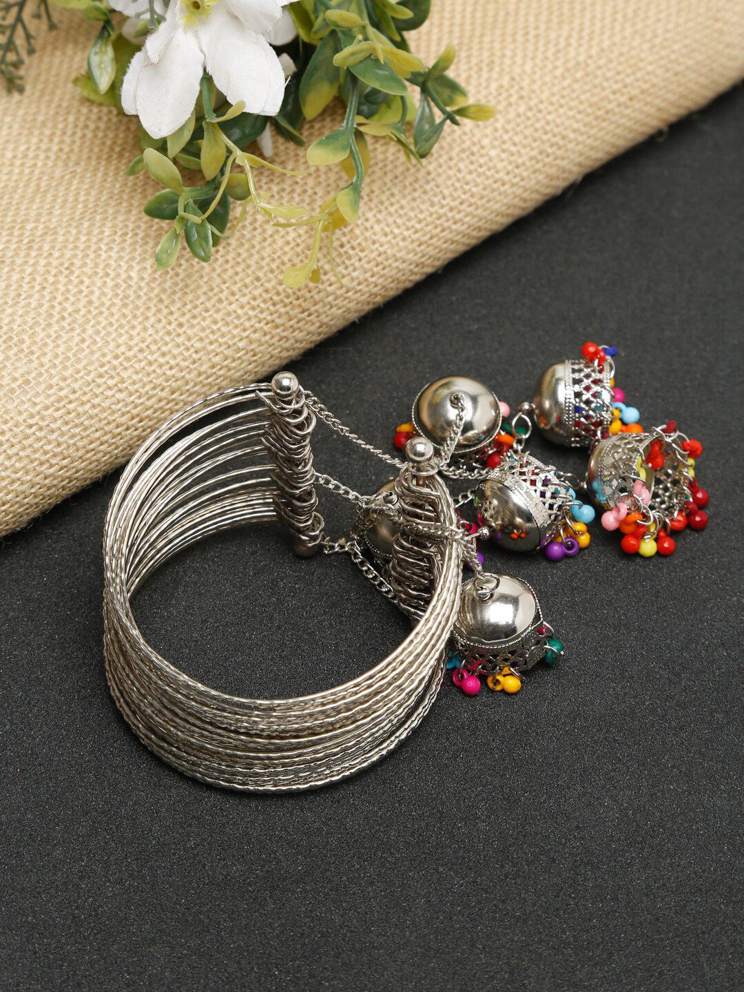 NEUDIS Women Silver-Toned Silver-Plated Bangle-Style Bracelet Price in India