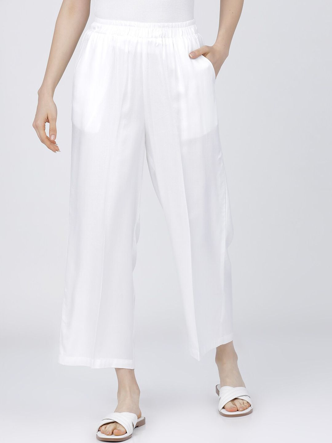 Tokyo Talkies Women White Slim Fit Parallel Trousers Price in India