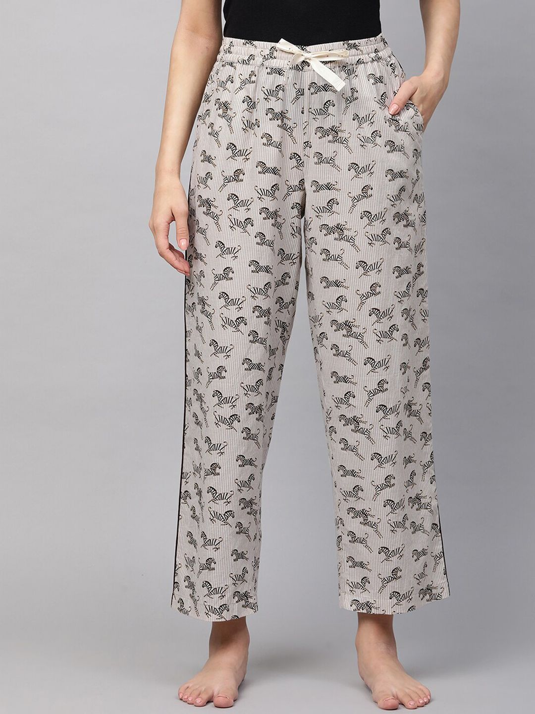 Chemistry Women Beige & Black Printed Lounge Pants Price in India