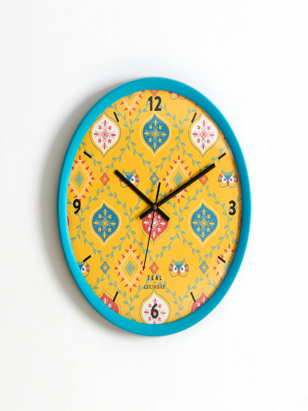 Chumbak Teal Blue & Yellow Printed 30 cm x 38 cm Traditional Wall Clock Price in India