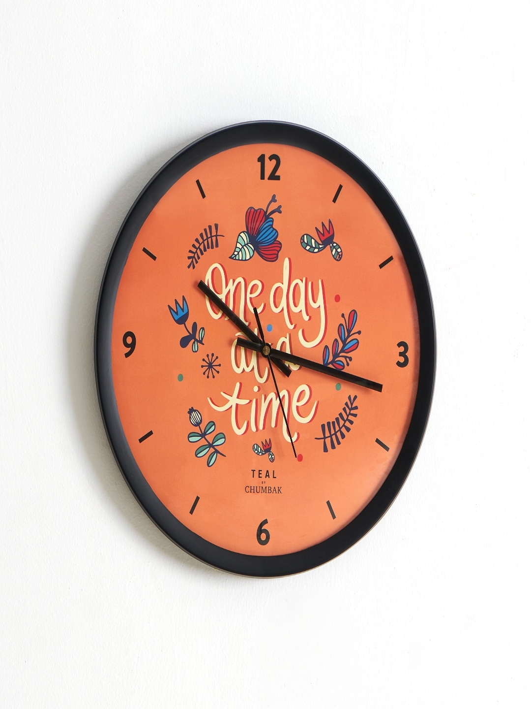 Chumbak Black & Orange Printed 30 cm x 38 cm Contemporary Wall Clock Price in India