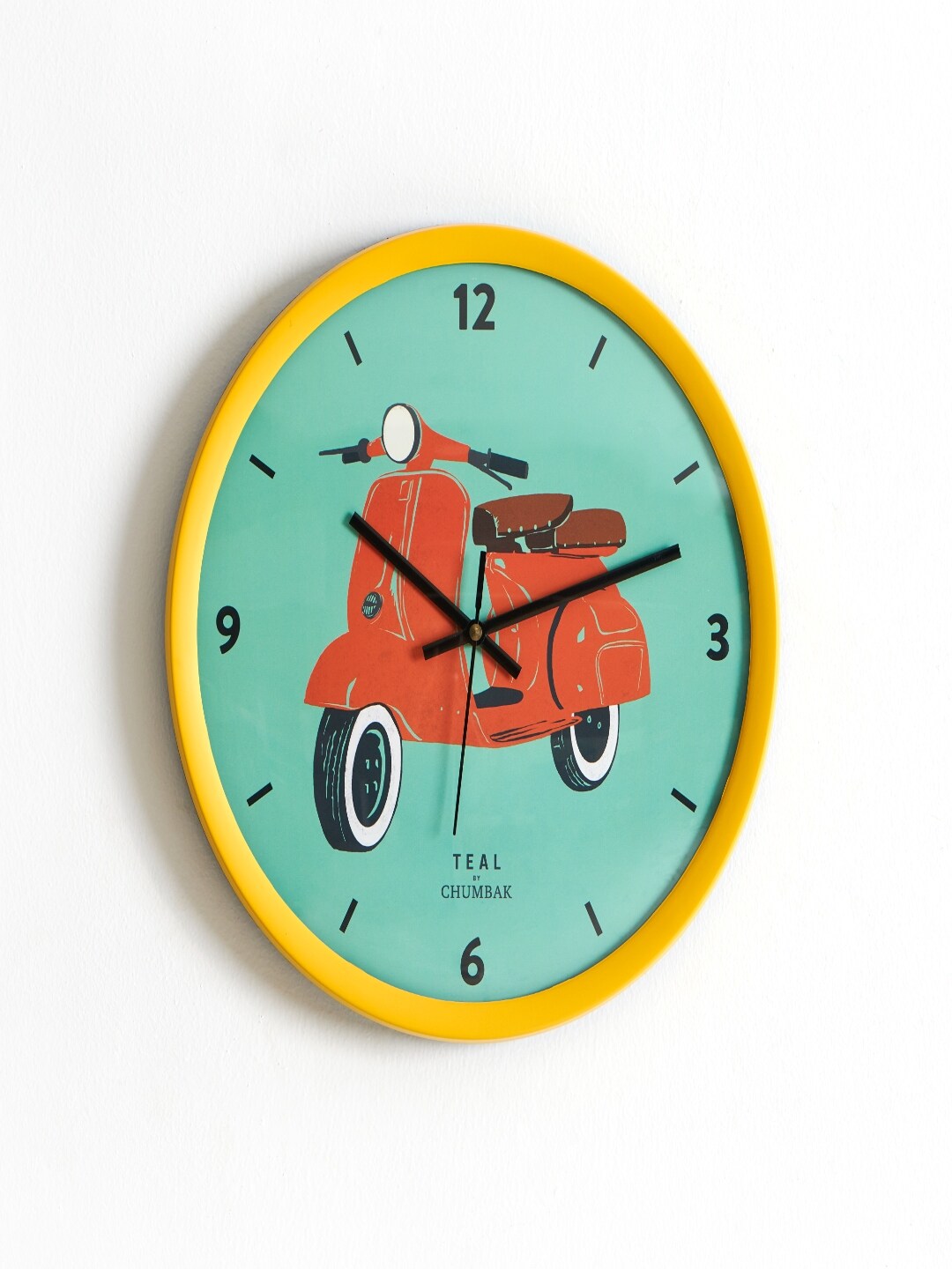 Chumbak Turquoise Blue & Yellow Printed 30 cm x 38 cm Contemporary Wall Clock Price in India