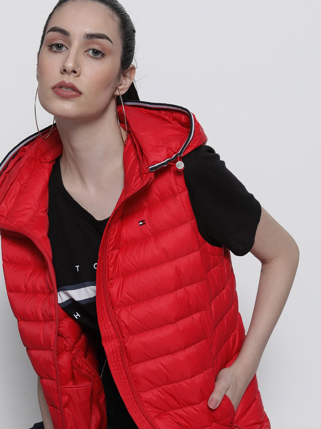 Tommy Hilfiger Women Red Solid Sleeveless Casual Hooded Padded Jacket Price in India