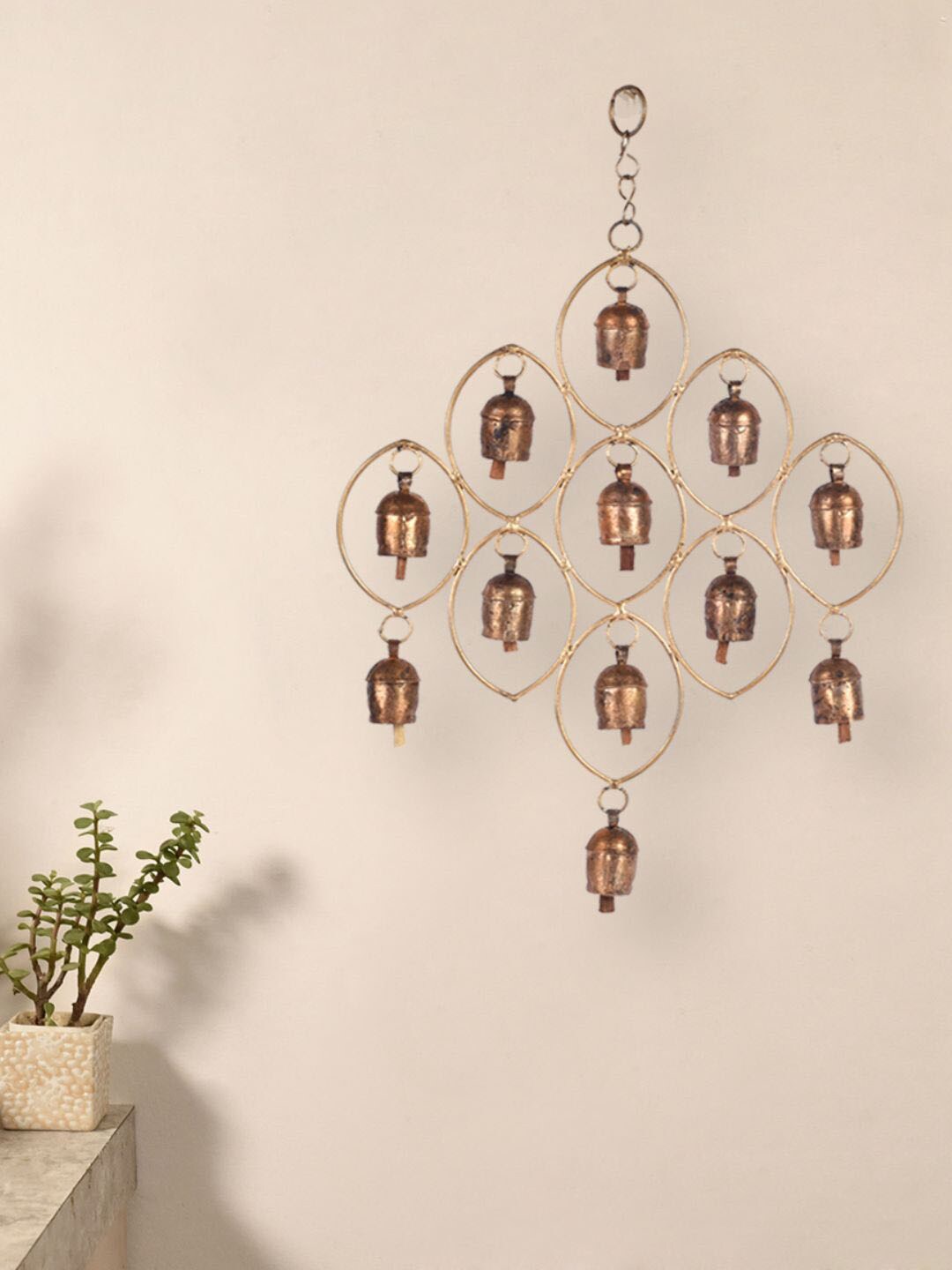 Unravel India 12 Copper-Toned Bells Antique Finished Wind Chimes Price in India