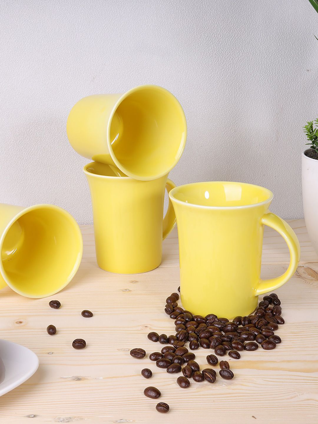 Ariane Yellow Set of 4 Handcrafted Solid Porcelain Glossy Mugs Price in India