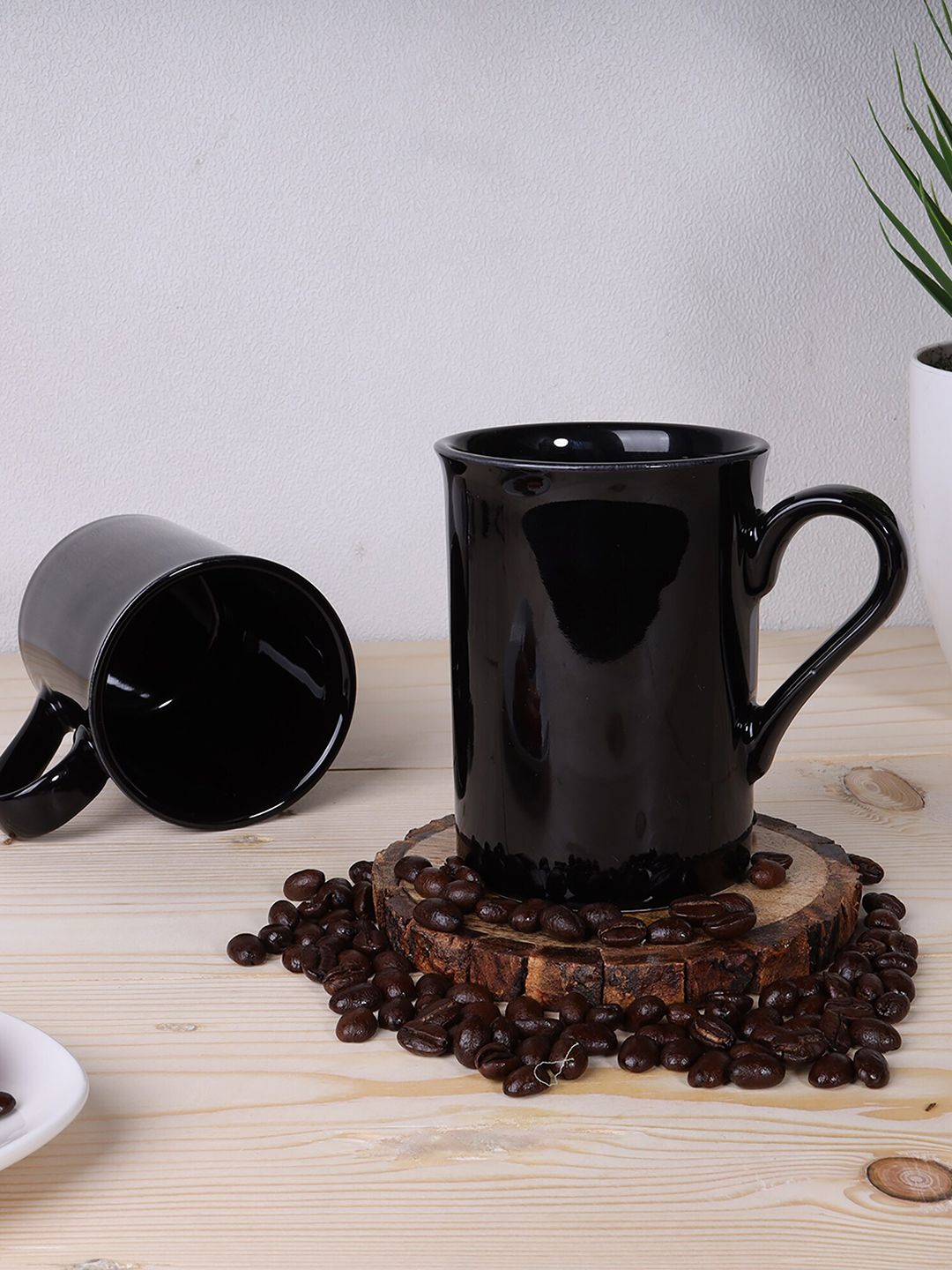 Ariane Set of 2 Black Handcrafted Solid Porcelain Glossy Mugs Price in India