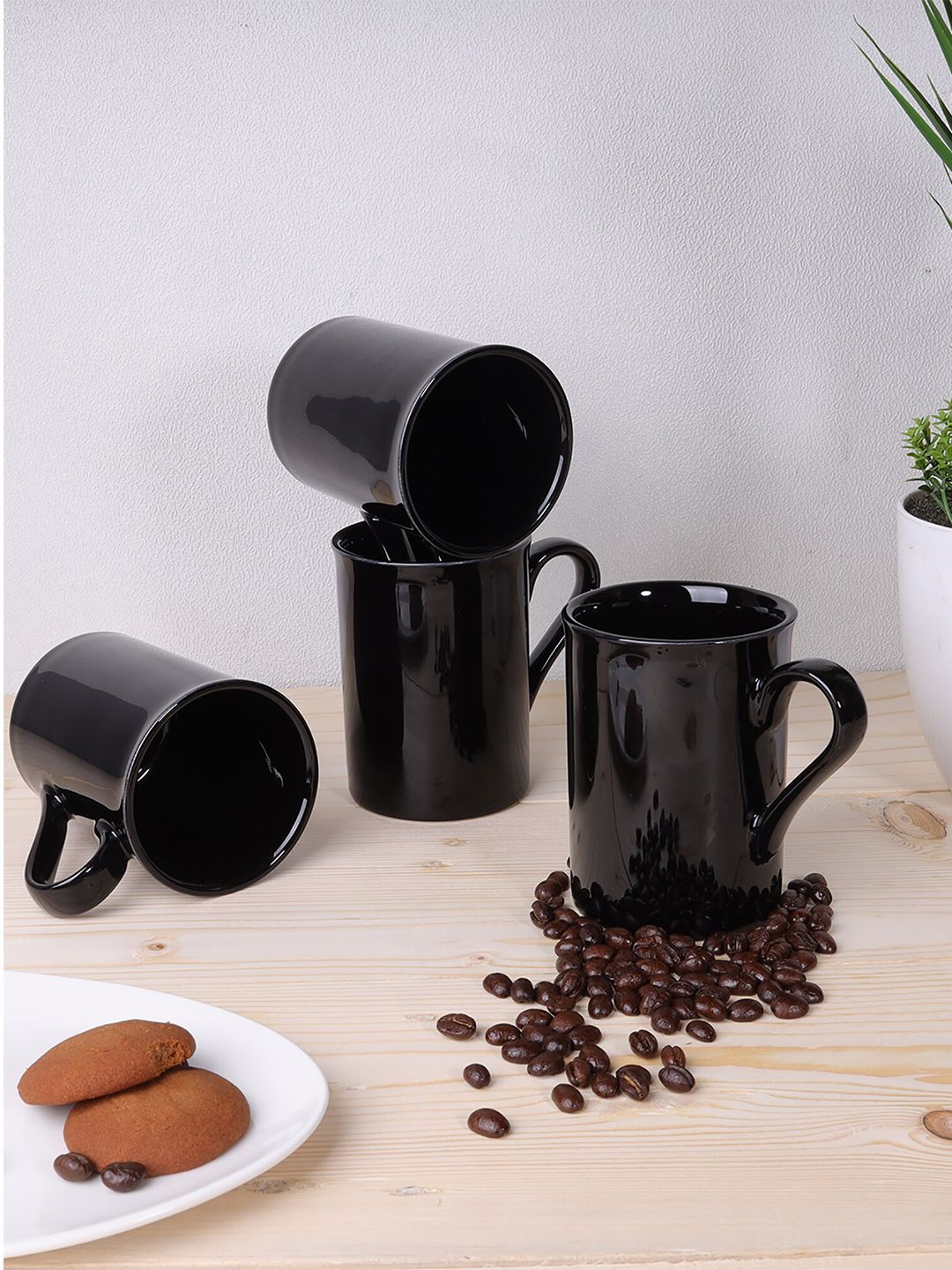 Ariane Set of 4 Black Handcrafted Solid Porcelain Glossy Mugs Price in India