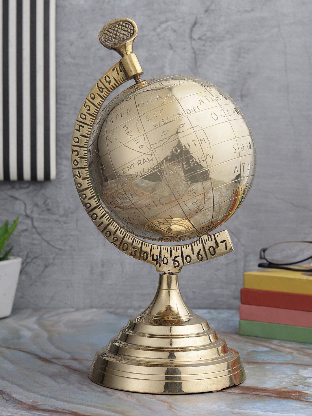 EXIM DECOR Gold-Toned Globe Showpiece Price in India