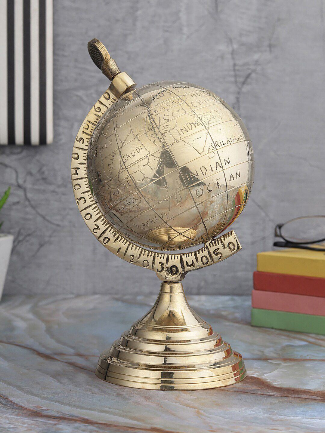 EXIM DECOR Gold-Toned Brass Globe Showpiece Price in India