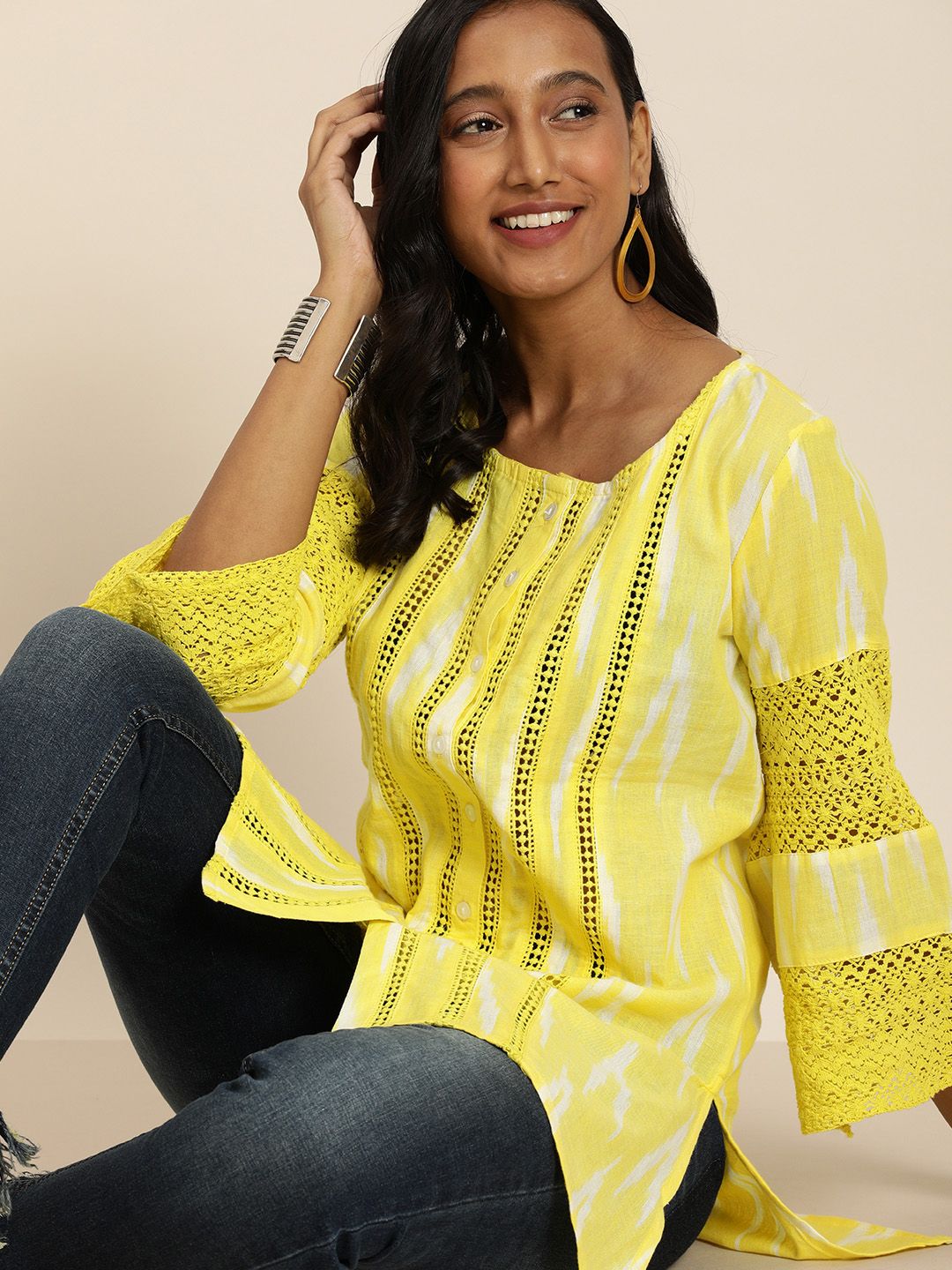 Taavi Yellow Ikat Woven Design Flared Sleeves Pure Cotton Kurti Price in India