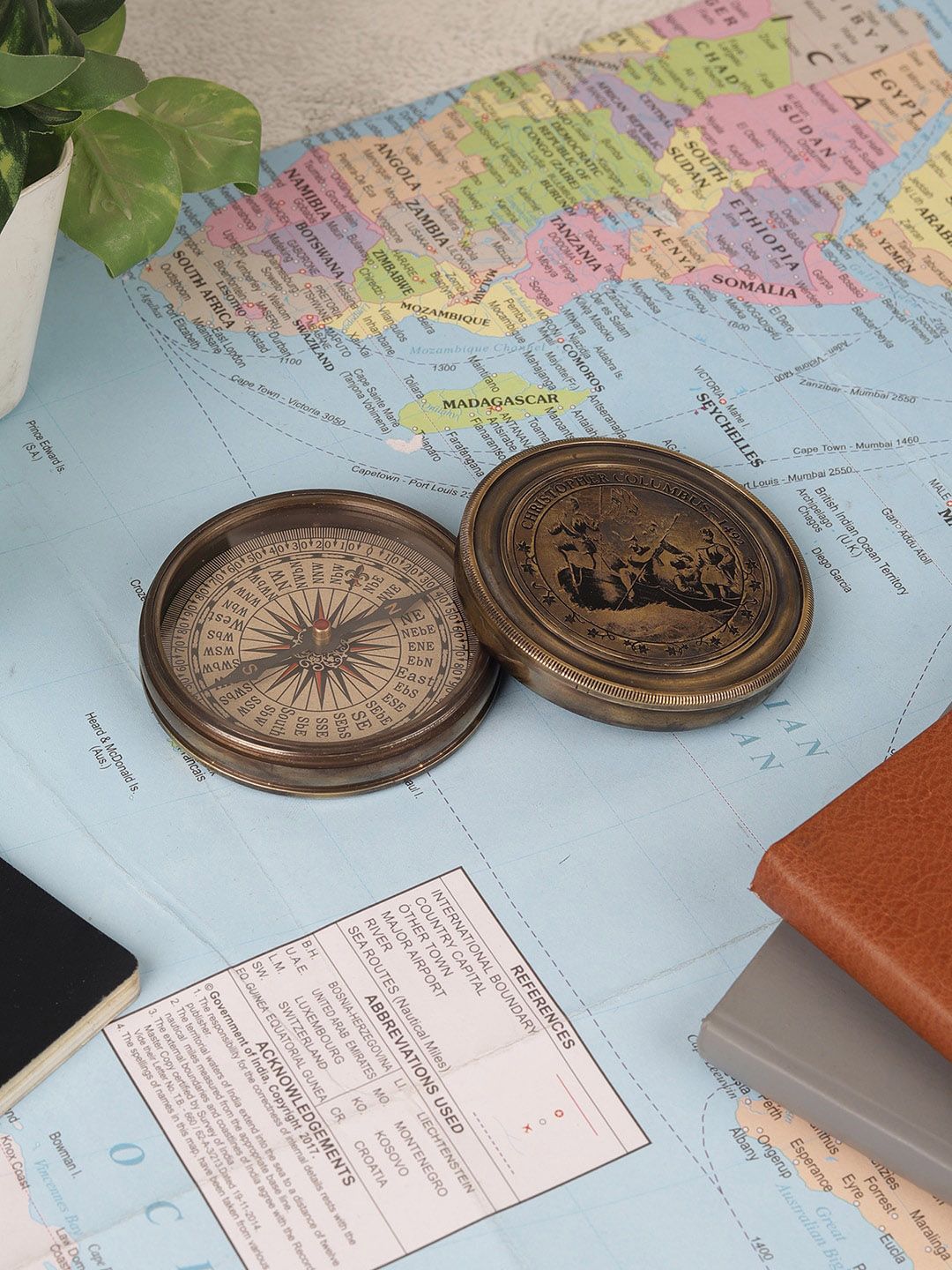 EXIM DECOR Antique Gold-Toned Christopher Columbus Compass Showpiece Price in India