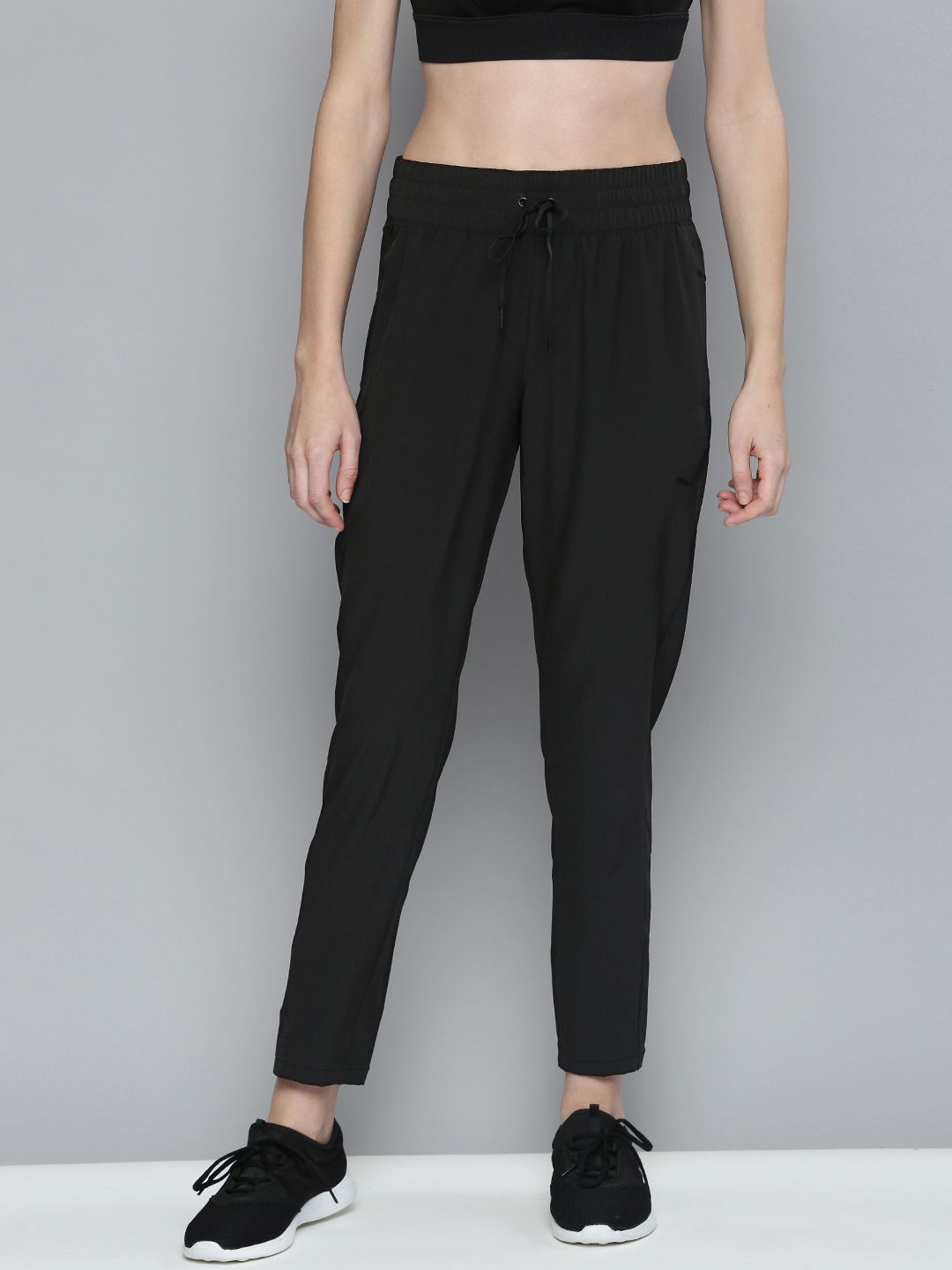 Puma Women Black Solid Slim Fit  Yoga Track Pants Price in India