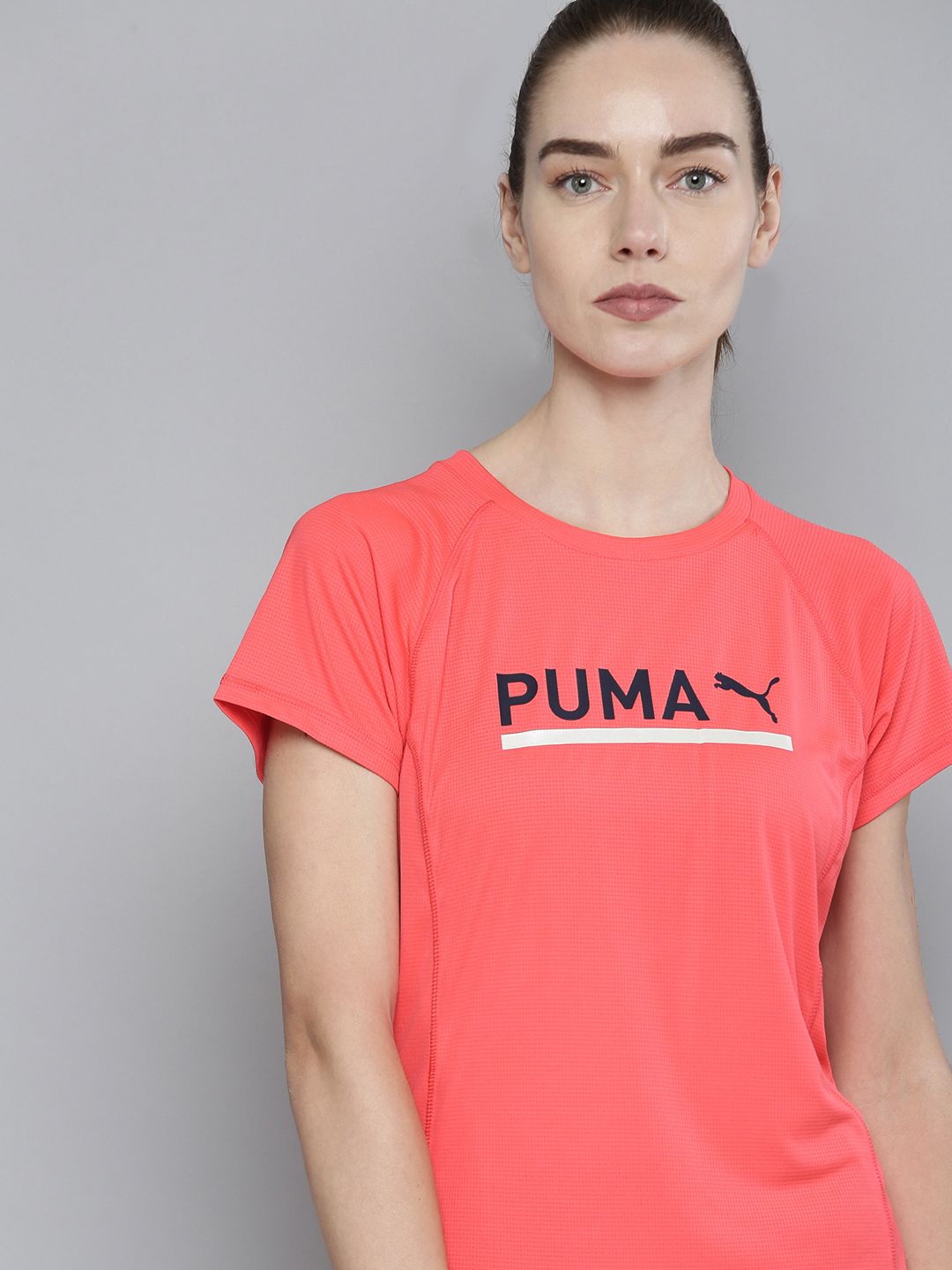 Puma Women Coral Pink RUN Logo Printed dryCELL Slim Fit Running T-shirt Price in India