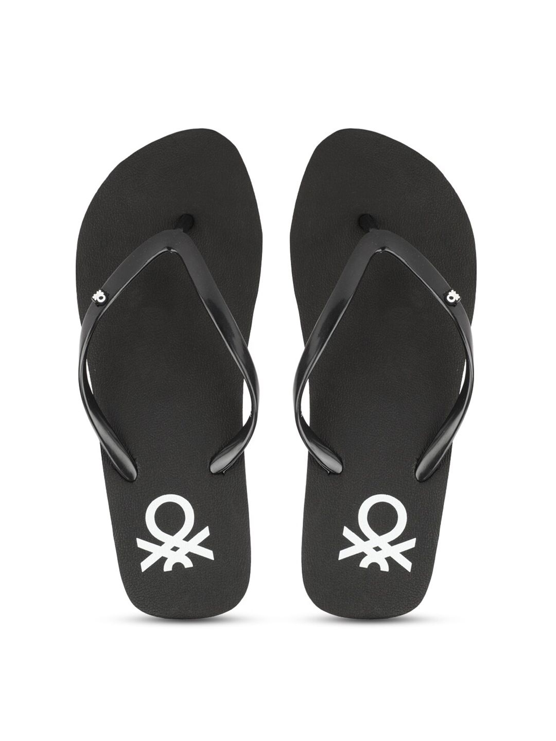 United Colors of Benetton Women Black Printed Rubber Thong Flip-Flops Price in India